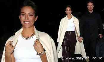 Frankie Bridge flashes a cheery smile as she steps out with husband Wayne to launch new book