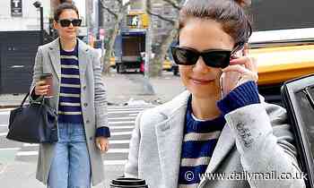 Katie Holmes sports messy bun and ripped jeans as she picks up coffee in New York City