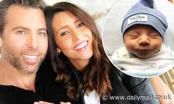 Grant Hackett 'feels like his darkest days are behind him' after welcoming a baby boy with fiancée