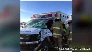 Three injured on Stoney Trail in collision involving a vehicle and an ambulance