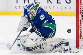 First-place Canucks beat Blues 3-1 for ninth straight home win