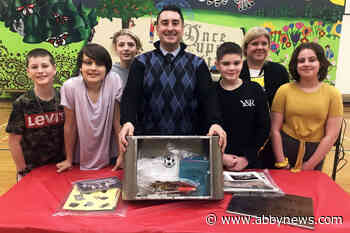 Newspapers, hockey cards discovered in Mission school’s forgotten time capsule