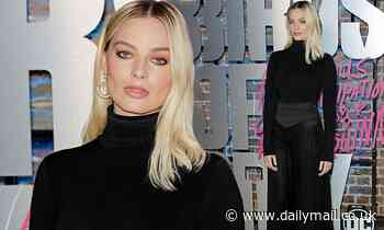 Margot Robbie showcases her chic sense of style  as she attends photo call for new flick