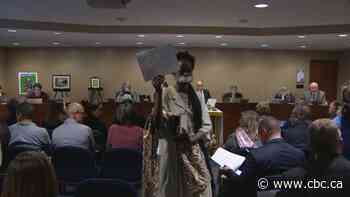 Silent protest held at Edmonton Catholic board meeting over do-rag dispute