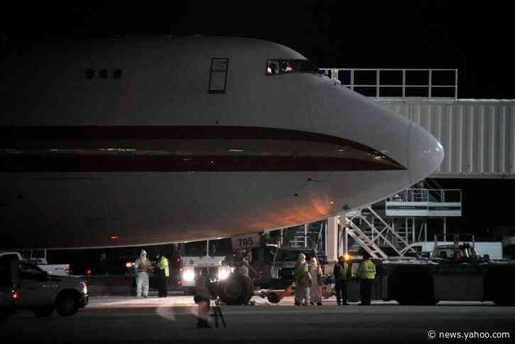 U.S., Japan pull nationals from China, big virus economic hit forecast