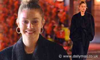Gigi Hadid bundles up in New York black amid Zayn Malik reunion - Daily Mail