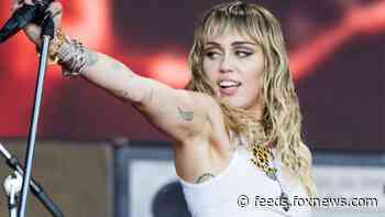 Miley Cyrus jokes about why she's 'not invited to awards show anymore'