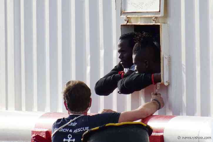 Aid ship with 403 migrants rescued off Libya docks in Italy