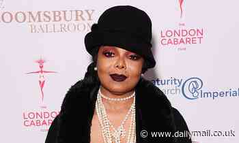 Janet Jackson draws inspiration from the 1920s in a silk dress and black fur coat