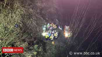 Boys rescued after suspected stolen car plunges into Bolton river - BBC News