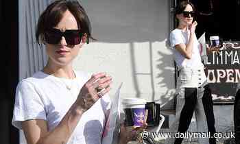 Dakota Johnson makes a fashion statement in button-up washed denim jeans