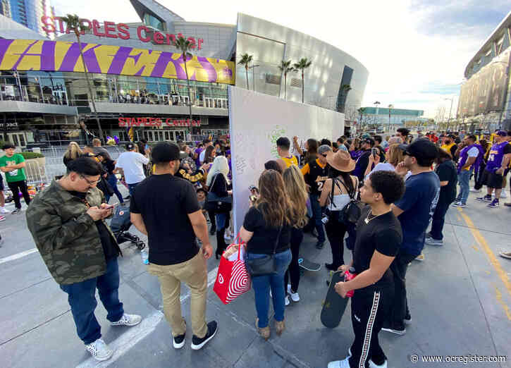 ‘Prepared to shed some tears,’ melancholy fans hang together at LA Live, at a Lakers game like no other