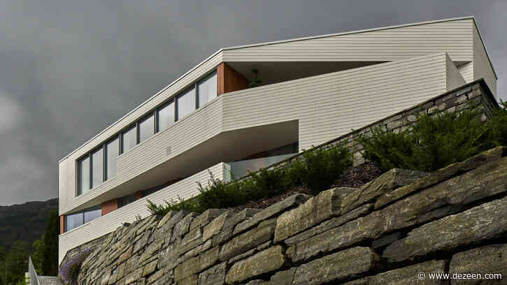 Angular outdoor terraces and feature staircase define house in Norway