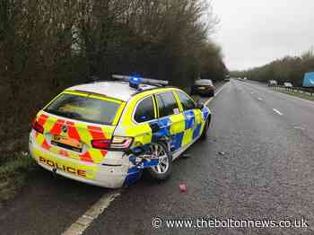 GMP echo call for caution after Sussex police car hit on A23
