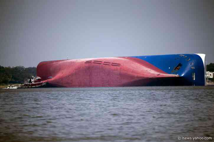 Crews removing capsized ship hope to beat hurricane season