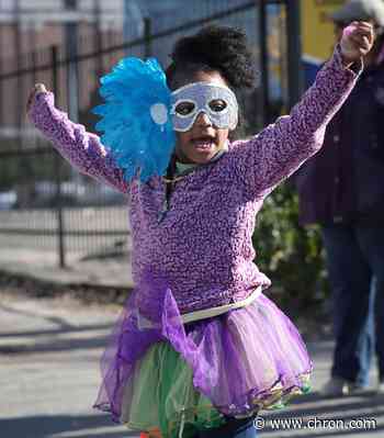Young Houston partiers let good times roll at downtown Mardi Gras parade