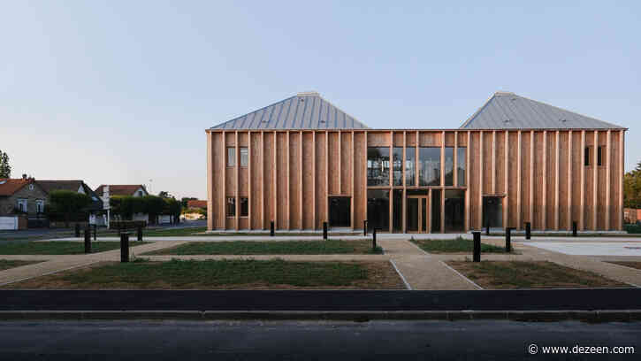 Timber health centre surrounds courtyard of medicinal plants
