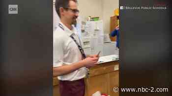 Teacher tears up as students give him new basketball shoes - NBC2 News