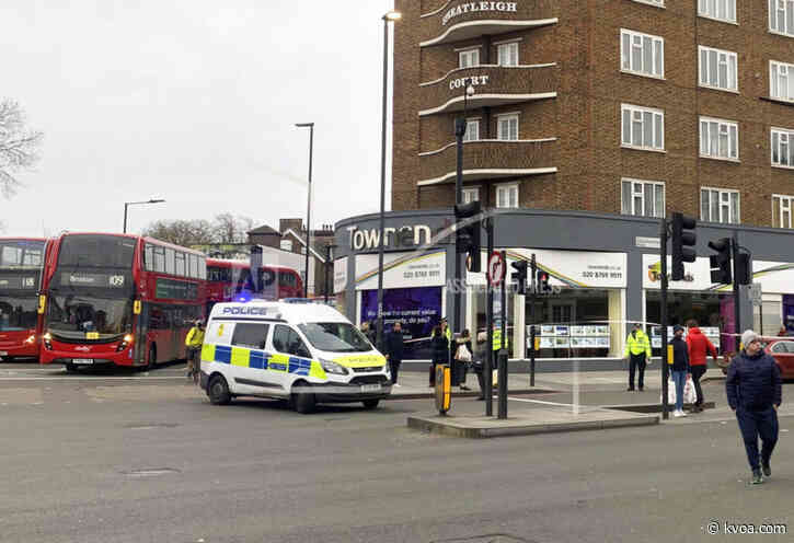 Man wearing fake bomb stabs 2 in London and is shot to death