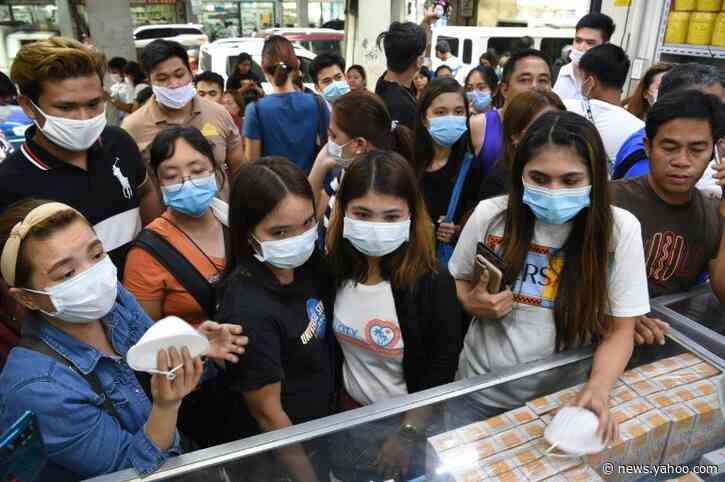 New Chinese city locked down as virus kills abroad