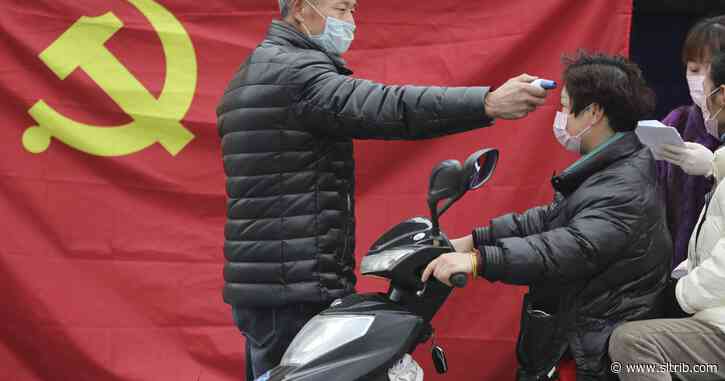 China opens virus hospital, market plunges as toll grows