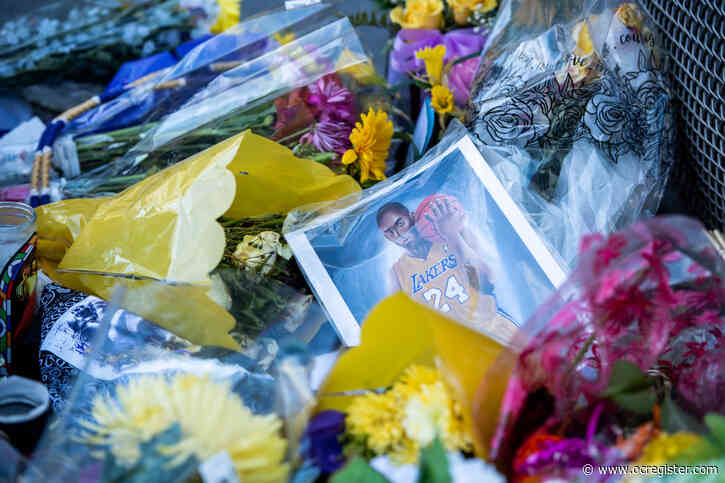 Crews haul away mourning fans’ massive Kobe Bryant memorial at Staples Center