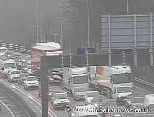 Long delays on the M60 after crash near Bolton junction
