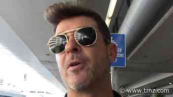 Robin Thicke Says Jay-Z's Getting People Talking, Sit or Stand
