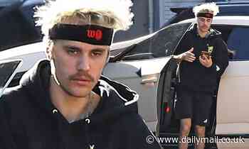 Justin Bieber cuts a casual figure as he arrives to studio in LA after revealing his drug use