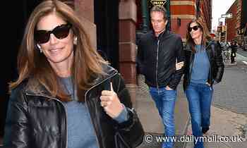 Cindy Crawford dons a medical boot while out and about with husband Rande Gerber