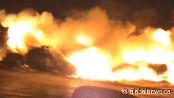 Large flames burn after train derailment near Saskatoon