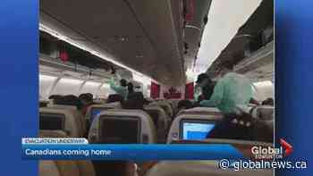 Canadians trapped in Wuhan, China on their way home