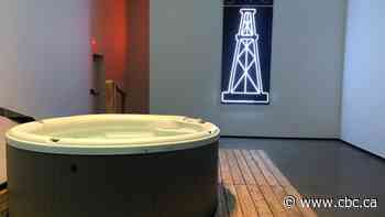 Exhibit immerses visitors in ideas of mortality, the end of days and sitting in tubs with strangers