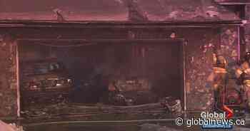 Attached garage, vehicles damaged by fire in south Edmonton