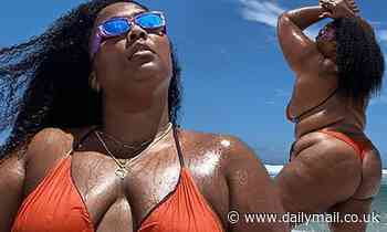 Lizzo strikes a pose in a skimpy red bikini following her first-ever performance in Brazil