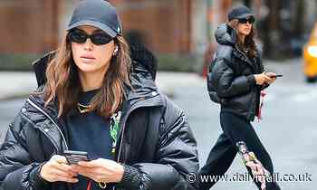 Irina Shayk cuts a cool streetwear look for stroll in NYC... after reuniting with ex Bradley Cooper 