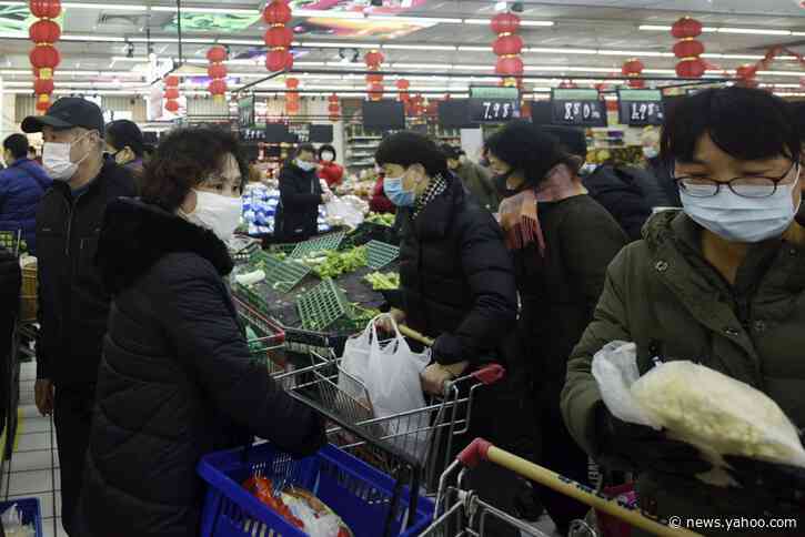 China scrambles to keep cities in virus lockdown fed