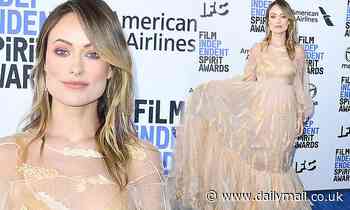 Olivia Wilde shows some skin in Victorian chic sheer nude Fendi at Film Independent Spirit Awards