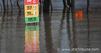 Cut off by spring floods, Minnesota town counting on Legislature