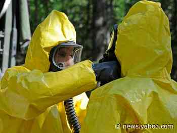 Americans in coronavirus quarantine were flown from Wuhan on cargo planes with no windows and flight crews dressed in full hazmat suits