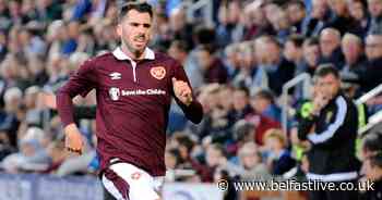 Northern Ireland defender Michael Smith admits he's got the coaching bug at Hearts - Belfast Live