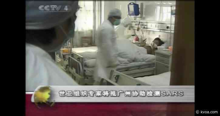 China’s virus death toll surpasses SARS but new cases fall