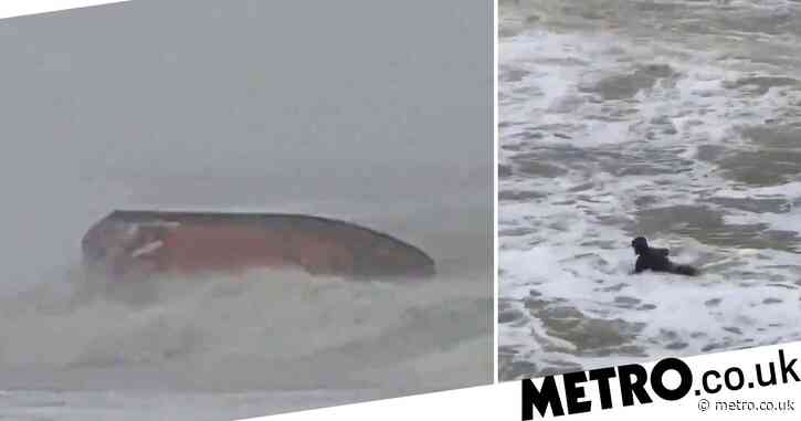 Lifeboat Almost Capsizes In Battle To Rescue Idiot Surfer During