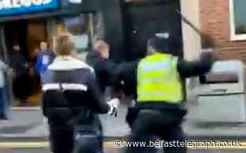 Police watchdog asked to investigate after young football fan hit with baton