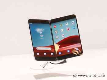 Microsoft's dual-screen Surface Duo phone shows up on a train     - CNET