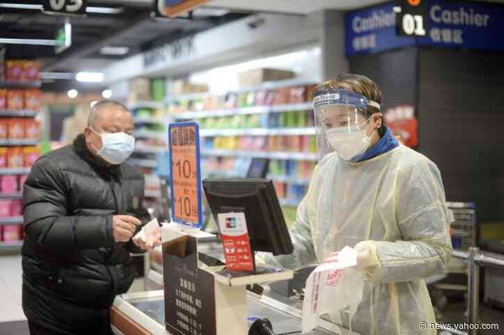 China president in rare visit to virus patients, medics