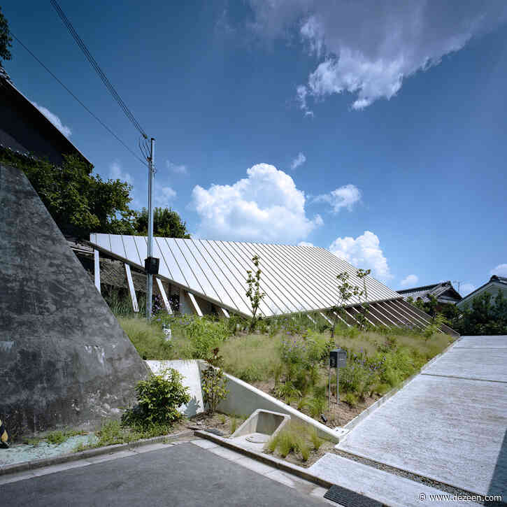 Large sloping roof shelters House in Gakuenmae by FujiwaraMuro Architects