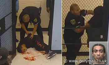 Cop smashes handcuffed man's face into corner of door frame in jail