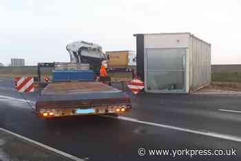 A1 northbound closed after portable cabin falls off lorry