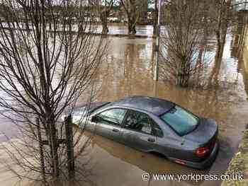 Car left in St George's Field Car Park stuck in floodwaters from River Ouse